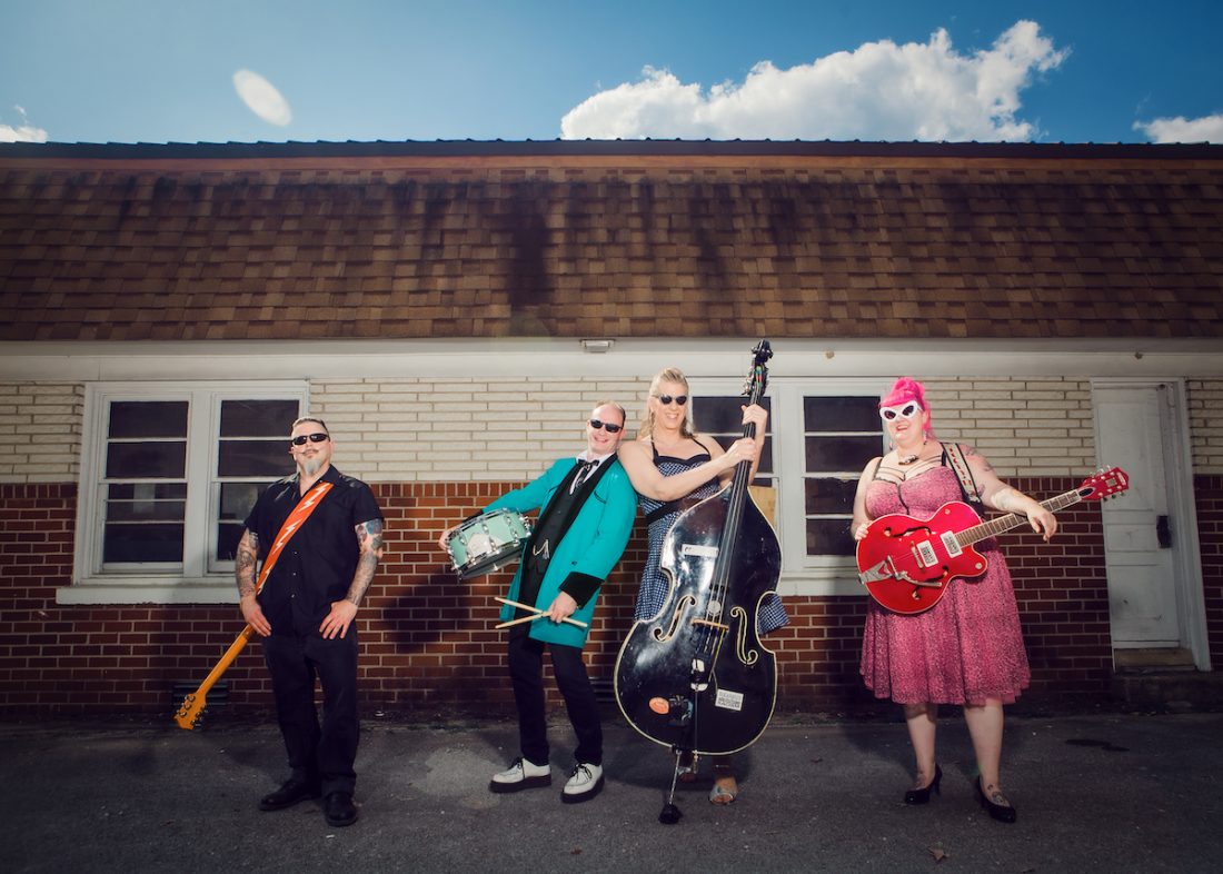 Jane Rose & The Deadends outside facing camera